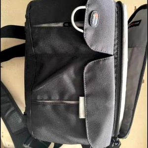 Black Lowepro waist camera pack.